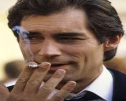Timothy Dalton smoking